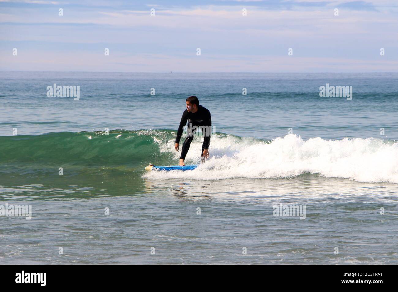 Surfer in the sea wearing a wetsuit hi-res stock photography and images ...