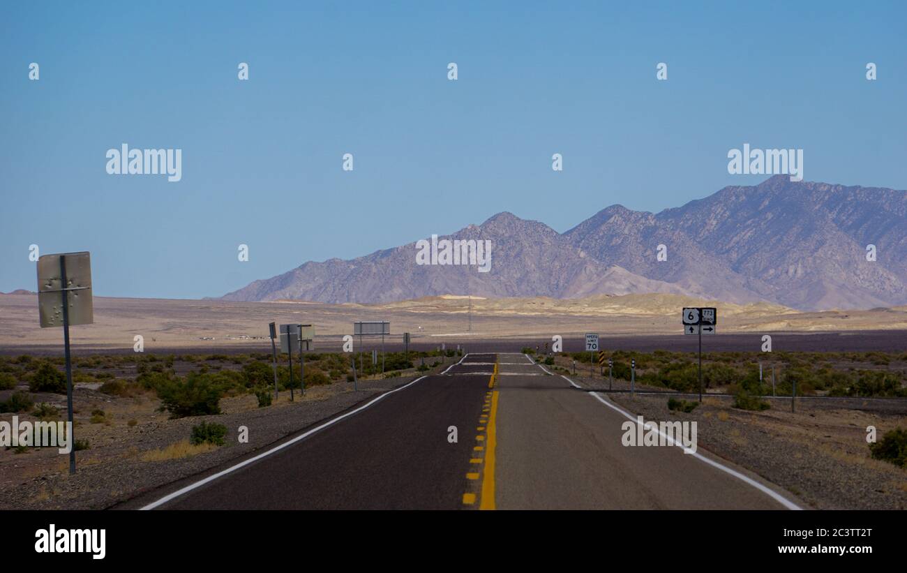 A lonely, iconic highway view in Nevada Stock Photo - Alamy