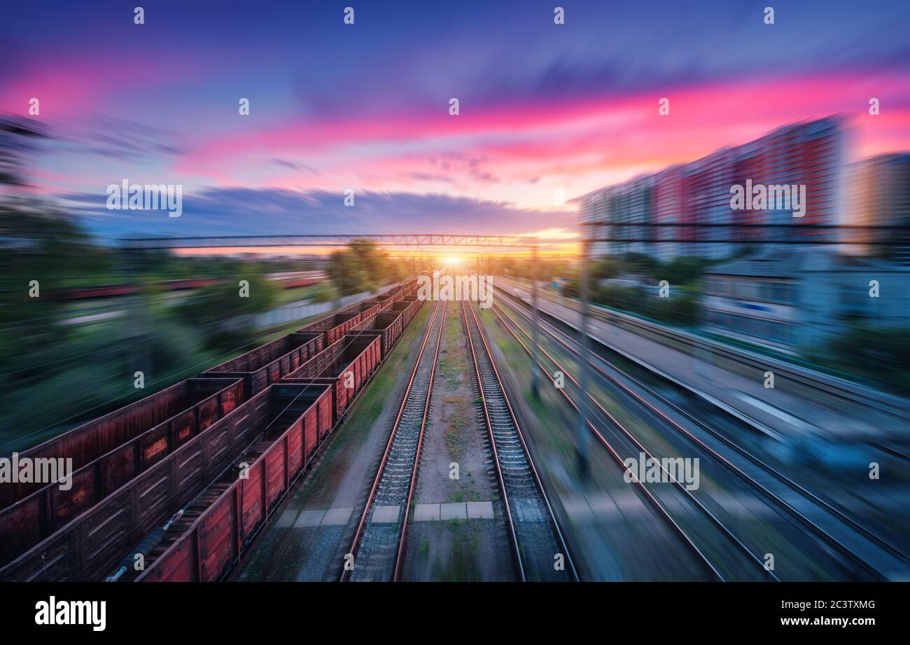 Aerial view of railroad and colorful sky with clouds at sunset Stock Photo