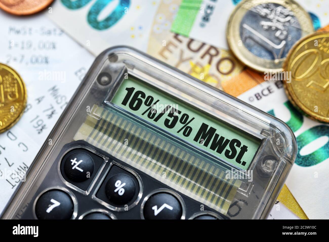 PHOTOMONTAGE, Lowered VAT rates on a calculator display, FOTOMONTAGE, Abgesenkte Mehrwertsteuersätze auf einem Taschenrechner-Display Stock Photo