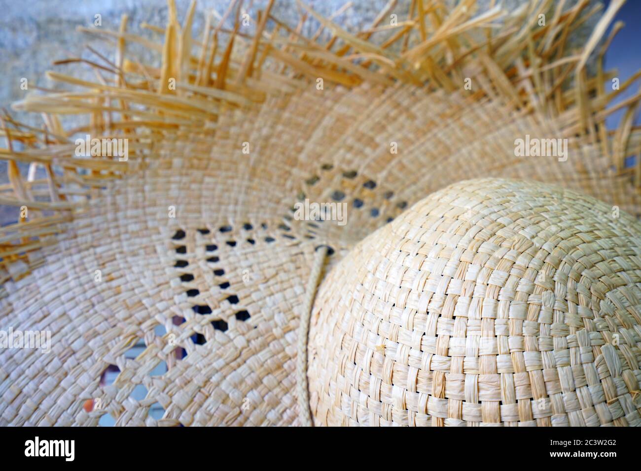Frayed straw hat hi-res stock photography and images - Alamy