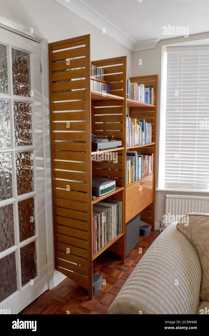 Photograph of mid 20th century furniture in a living room setting. With