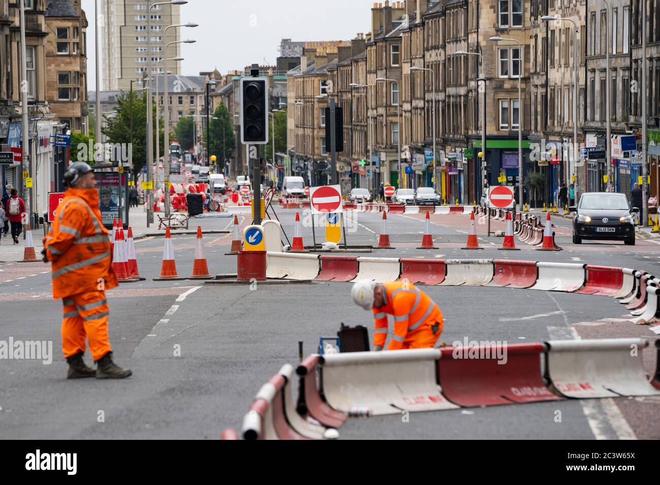 Edinburgh, Scotland, UK. 22 June, 2020. Traffic management work and lane closures on Leith Walk signals the start of construction work for the new Edinburgh tram line extension to Newhaven. Disruption to traffic and businesses on Leith Walk is expected to last for over a year. Iain Masterton/Alamy Live News Stock Photo