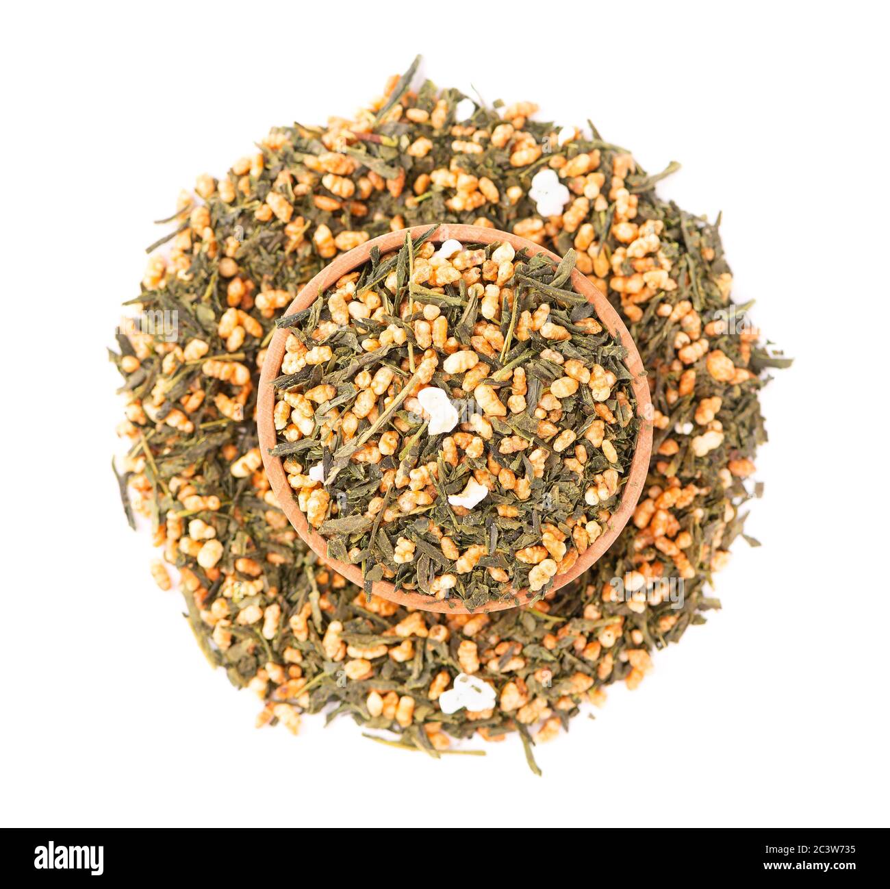 Japanese green tea Genmaicha, isolated on white background. Tea leaves