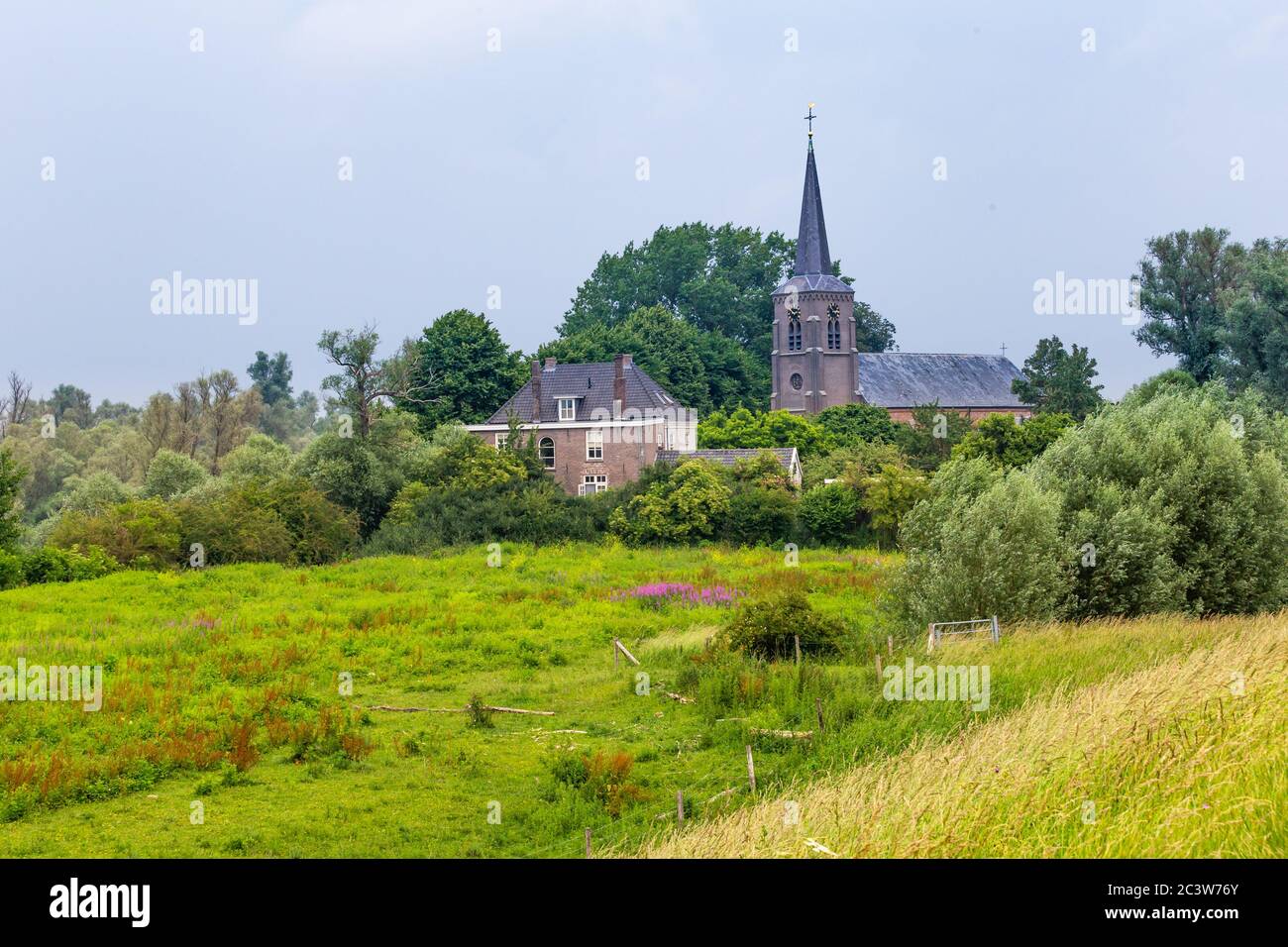 Idyllic Dutch little village Ooij in the Ooij polder located in the municipality of Berg en Dal, Gelderland in the Nethelands Stock Photo