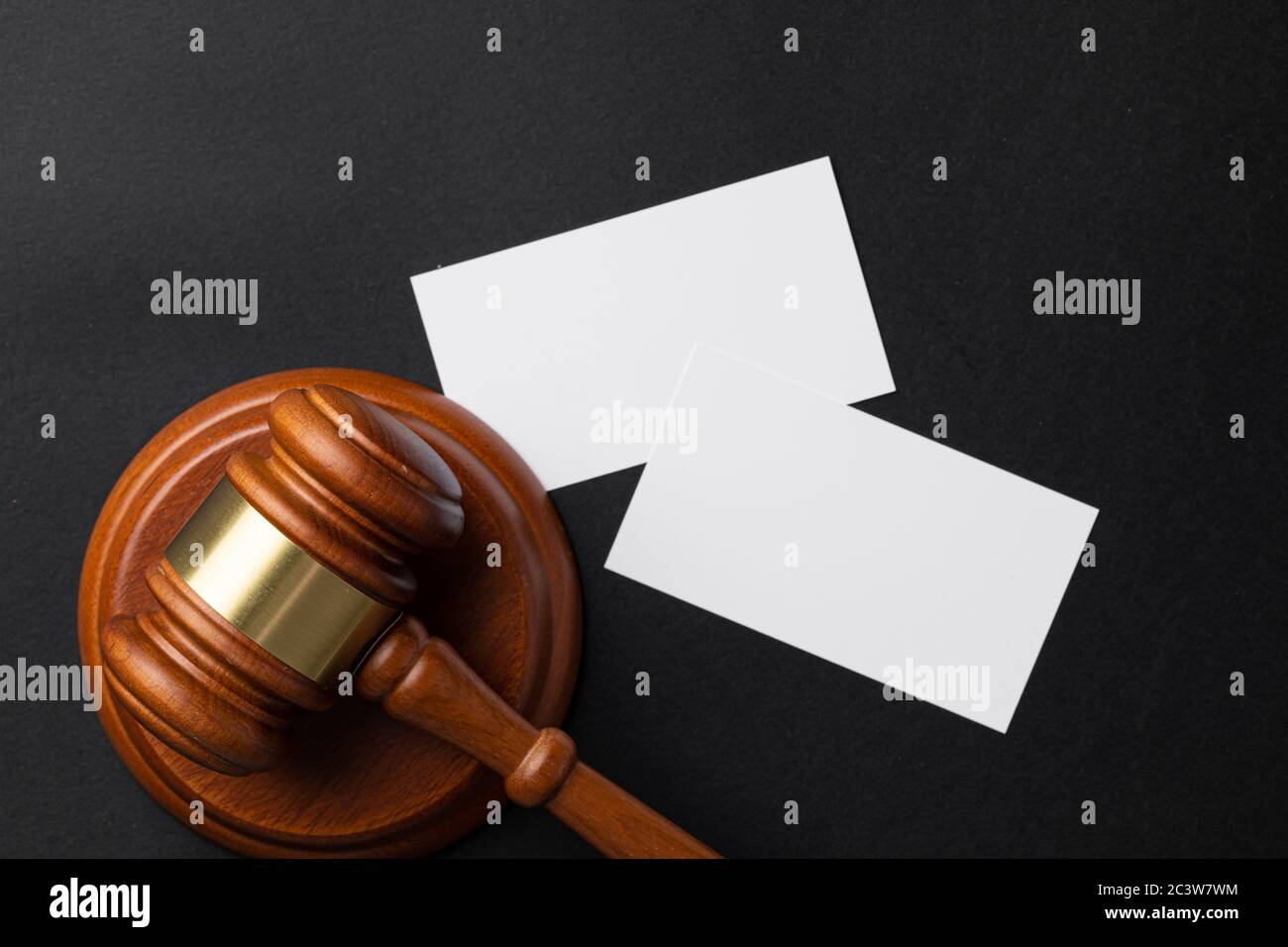 Judge wooden gavel with blank business cards on black Stock Photo Alamy