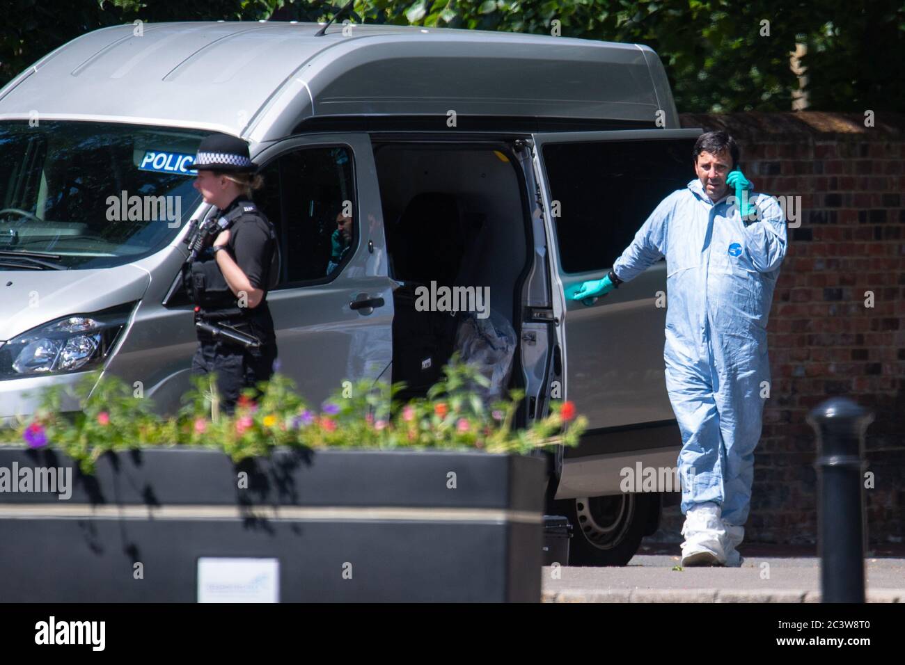A police forensics officer at work near Forbury Gardens, in Reading town centre, the scene of a multiple stabbing attack which took place at around 7pm on Saturday, leaving three people dead and another three seriously injured. Stock Photo