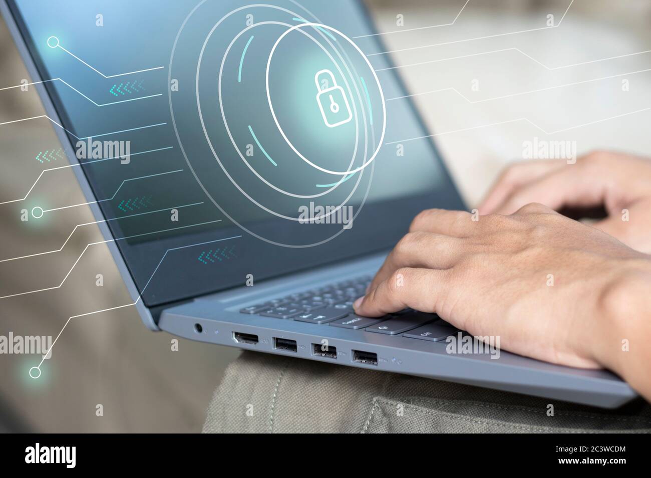 Businessman use Laptop with cybersecurity and information technology security services concept. Preventing data access in the network. Stock Photo