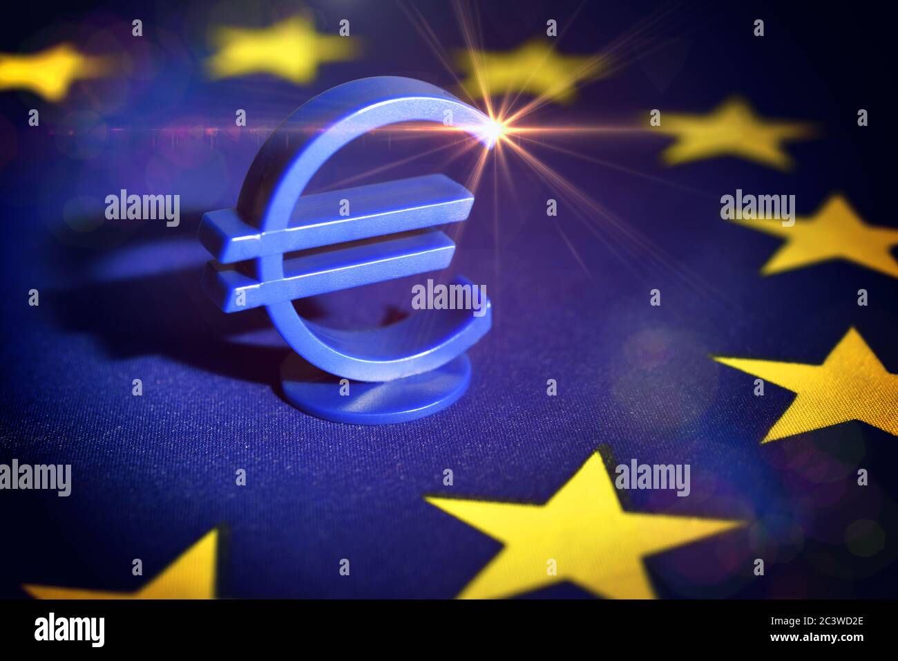 Euro sign on EU flag, EU Reconstruction Fund and EU aid, Eurozeichen auf EU-Fahne, EU-Wiederaufbaufonds und EU-Hilfen Stock Photo