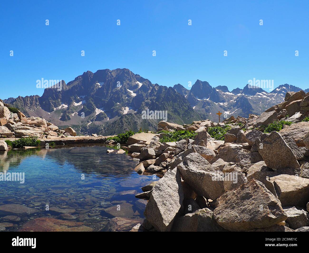 Scenic view of mountains against blue sky Stock Photo