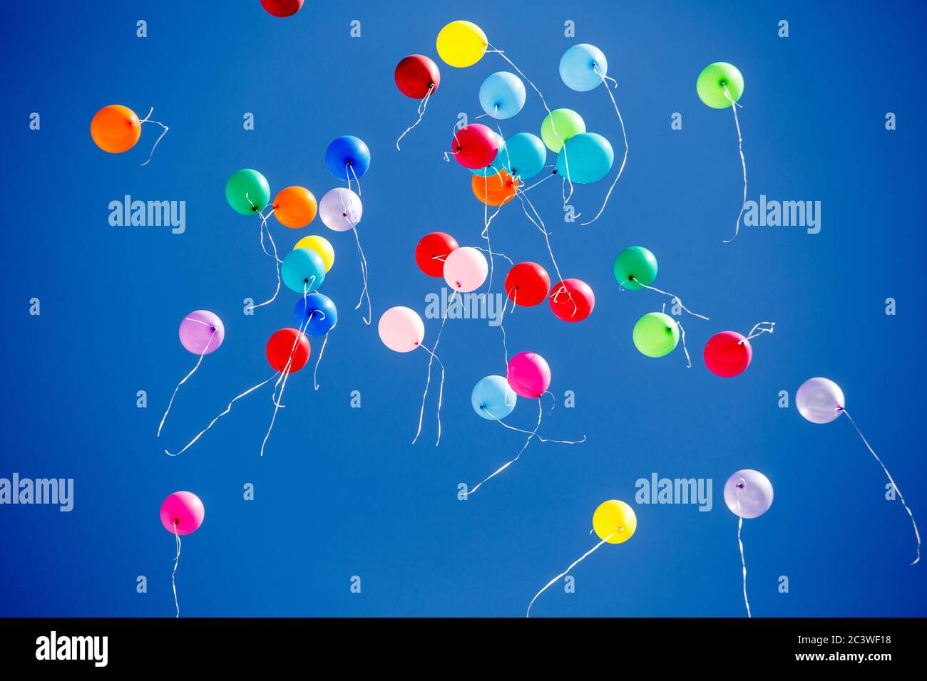 Helium balloons flying hi-res stock photography and images - Alamy