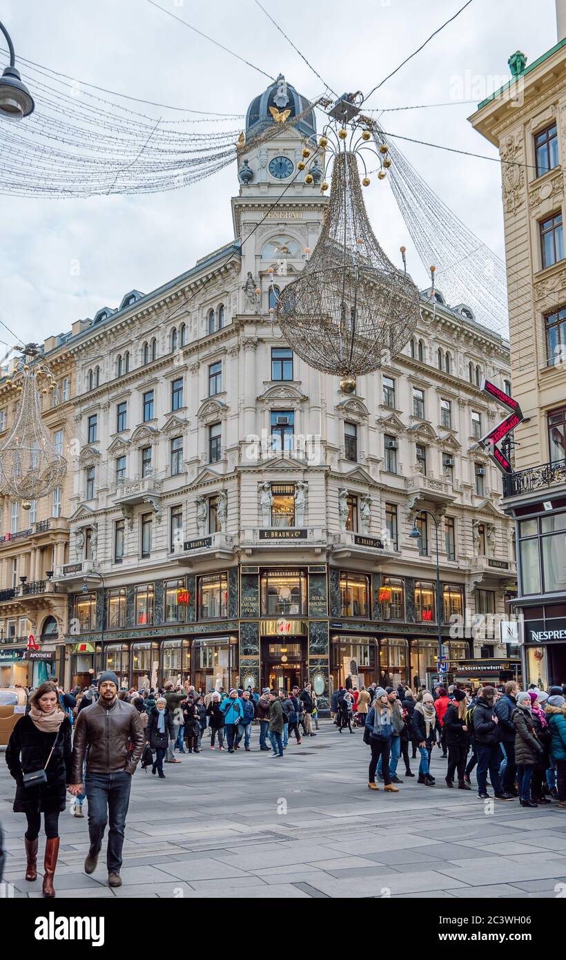 Graben Street filled with many tourists at Christmas in the background, is a beautiful building with classic Viennese architecture, Vienna, Austria. Stock Photo