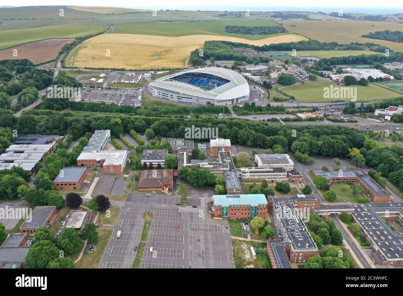 Aerial view of Sussex University with Brighton and Hove football