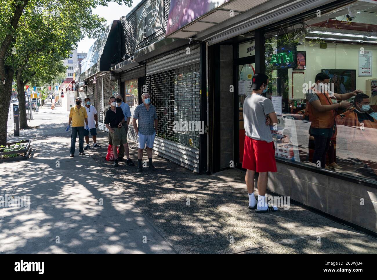 New York, NY - June 22, 2020: Barbershops in the Bronx started to serve customers and perform haircuts as New York City enters phase 2 of reopening Stock Photo