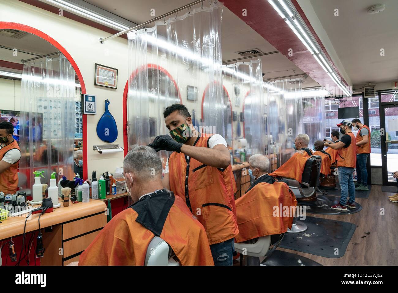 New York, NY - June 22, 2020: Barbershops in the Bronx started to serve customers and perform haircuts as New York City enters phase 2 of reopening Stock Photo
