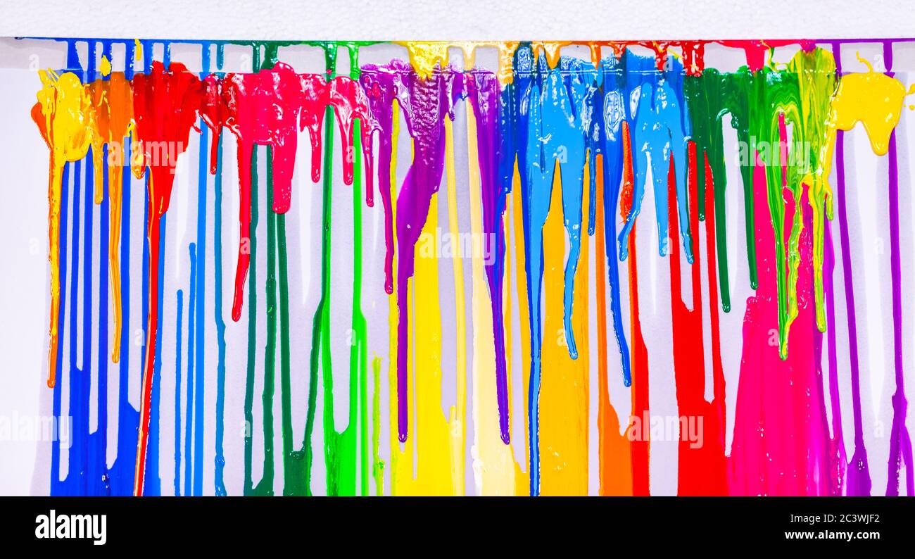 colorful of screen printing ink are dripping on white background Stock