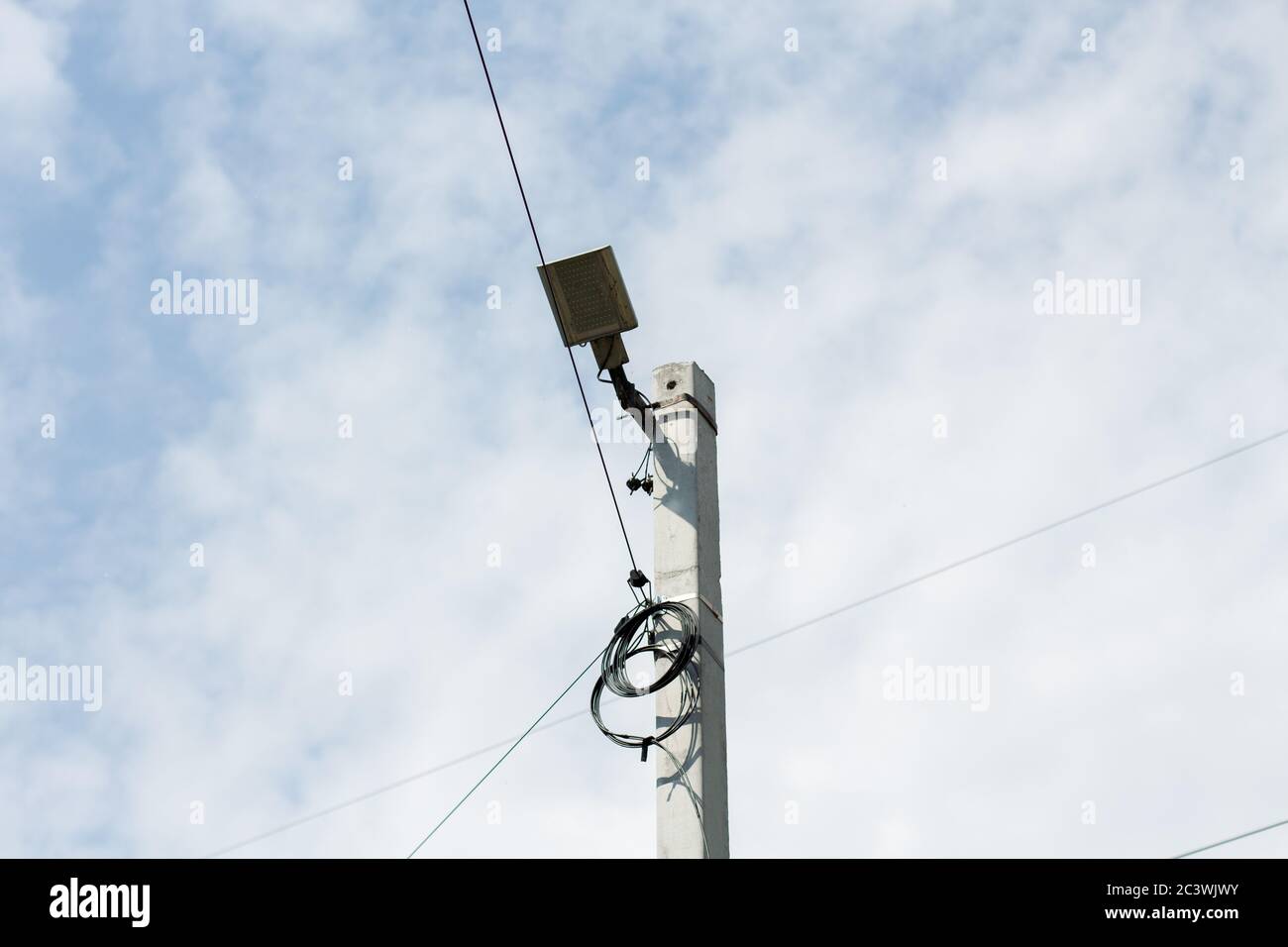 pole with electric wires in village Stock Photo - Alamy