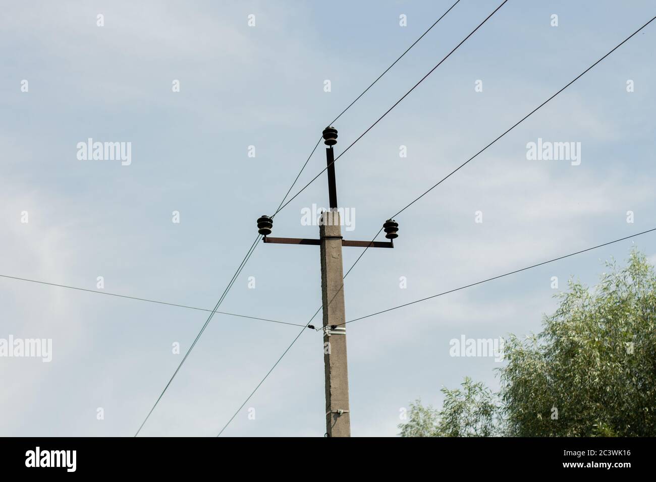pole with electric wires in village Stock Photo - Alamy