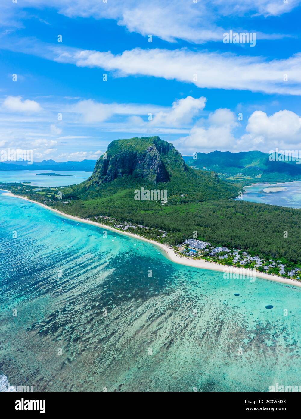 Aerial panoramic view of Mauritius island - Detail of Le Morne Brabant mountain with underwater waterfall perspective optic illusion - Wanderlust and Stock Photo