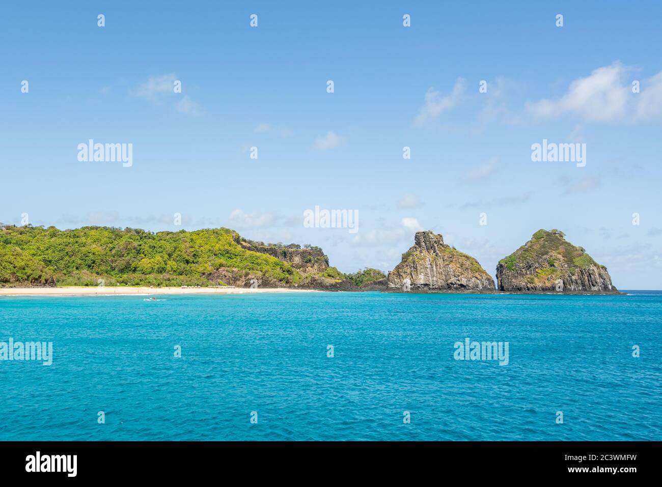 Beautiful background view of Cacimba do Padre beach with Dois Irmaos Hill and turquoise clear water, at Fernando de Noronha, Unesco World Heritage sit Stock Photo