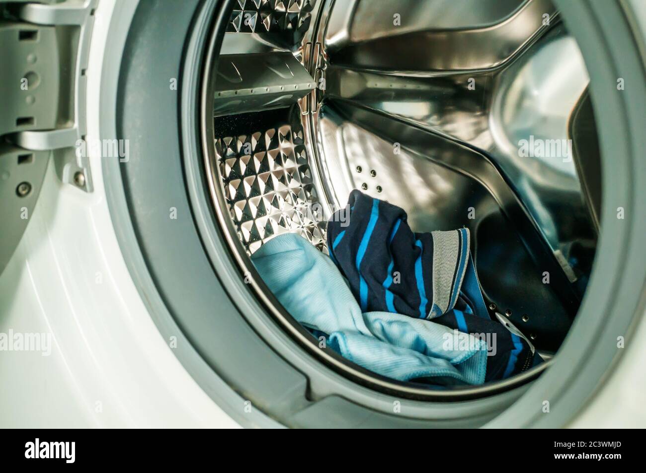 Open washing machine drum closeup. washing machine is ready to load things Stock Photo Alamy