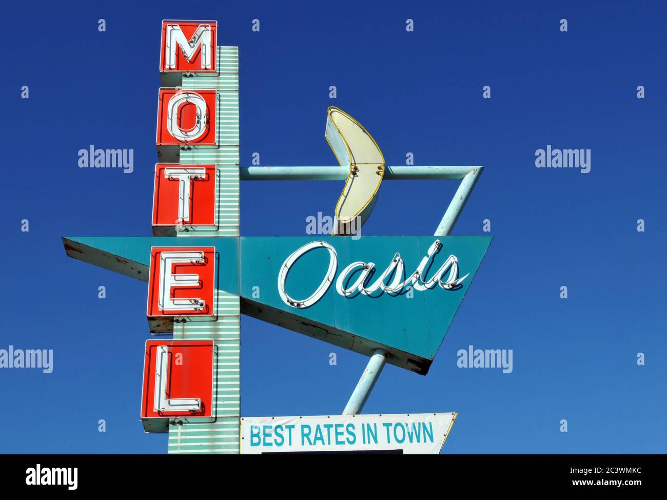Colourful vintage neon sign against a blue sky advertising the Oasis Motel on Route 66 in Tulsa, Oklahoma. Stock Photo