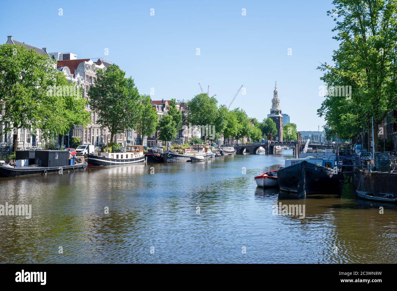 Oudeschans in the centre of Amsterdam, Netherlands  Canals are quiet during coronavirus lockdown Stock Photo
