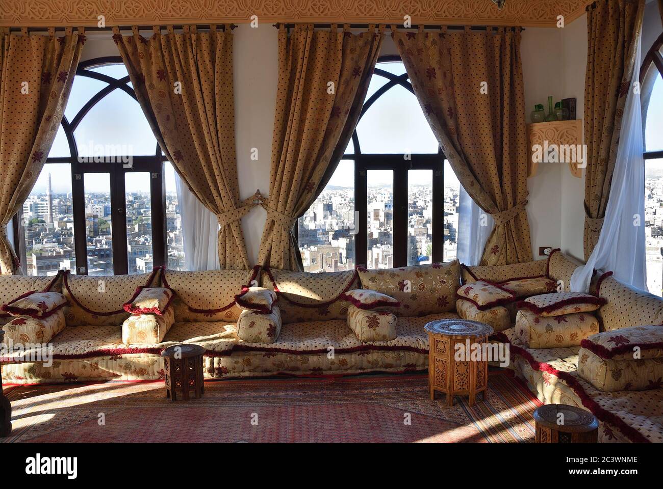 Sanaa, Yemen - March 12, 2010: Interiors of relaxation room in Sanaa hotel. This room used for for smoking hookah and chewing qat Stock Photo