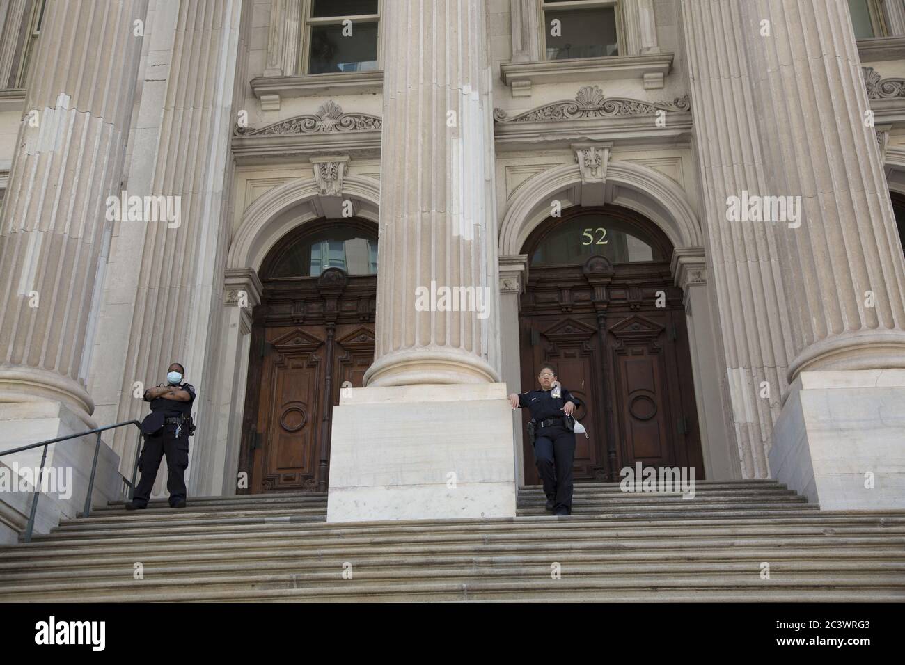 Demonstration and march near NYC City Hall on Juneteenth keeps up the pressure to end police brutality, especially against blacks, and to change the system to reflect true equality for all citizens. New York City. Stock Photo