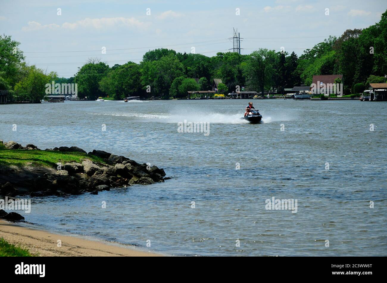Jet Ski cruising the Fox River in Northern Illinois, USA. Stock Photo