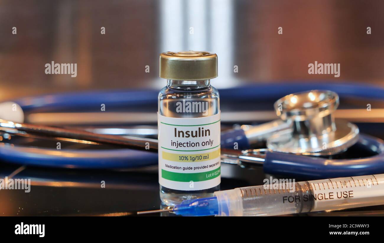 Vial of insulin injection whit syringe and stethoscope stainless steel ...