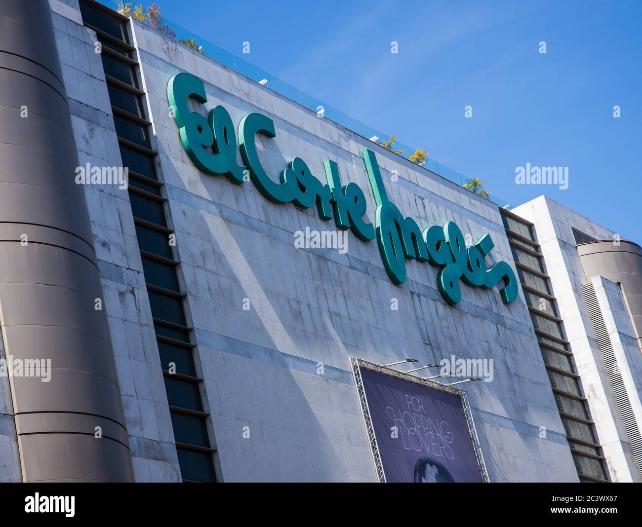 El Corte Inglés sign on top of the 10-floors shopping complex in Lisbon Portugal Stock Photo