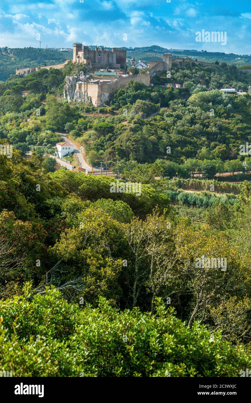 View of the medieval Óbidos Castle and walls and surrounding countryside Portugal Stock Photo