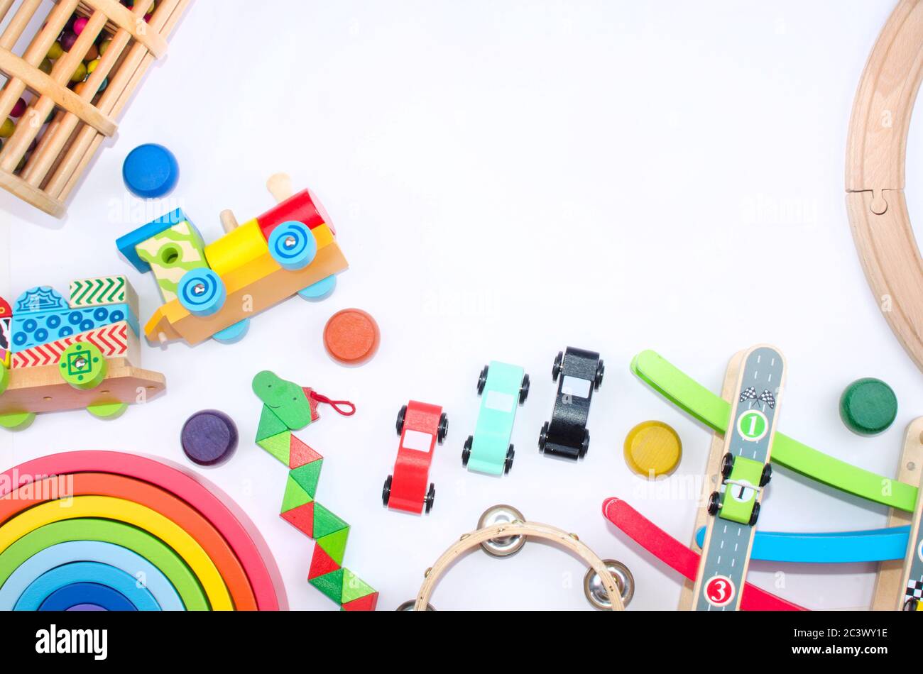 wooden colored toys whit montessori pedagogy and space for text Stock Photo
