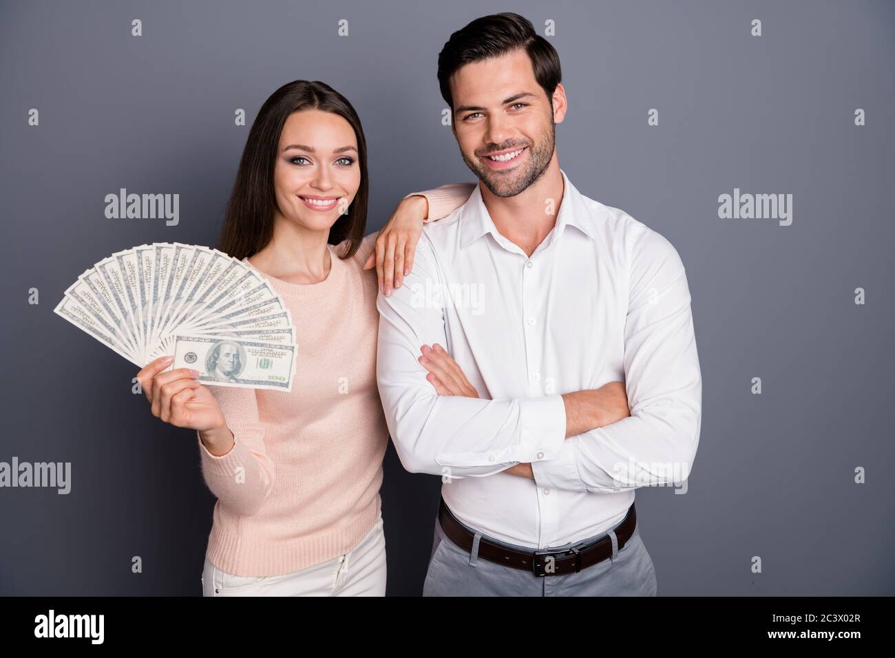 Photo attractive lady handsome guy stand side by side arms crossed