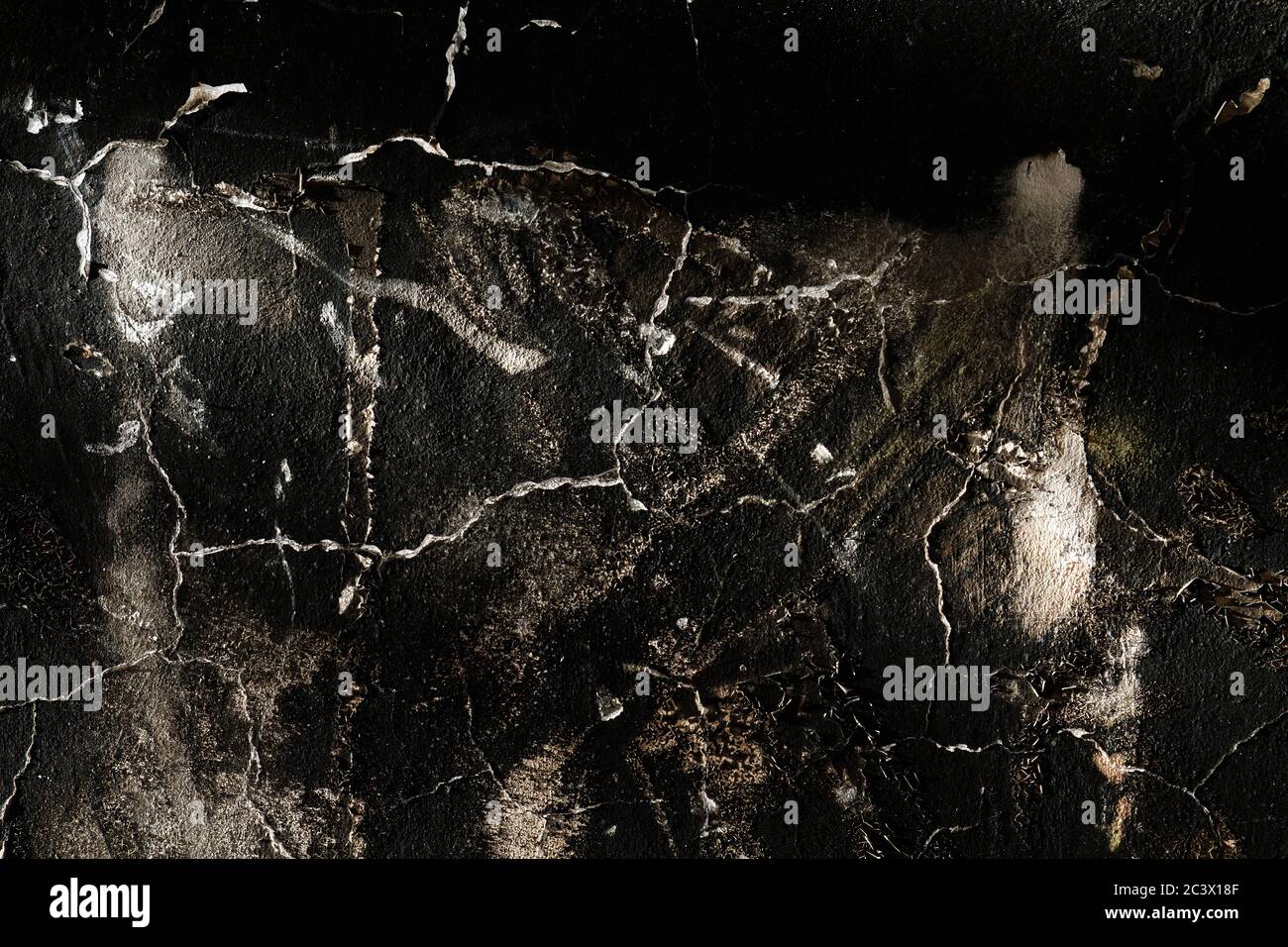 Old burned wall with peeling paint Stock Photo