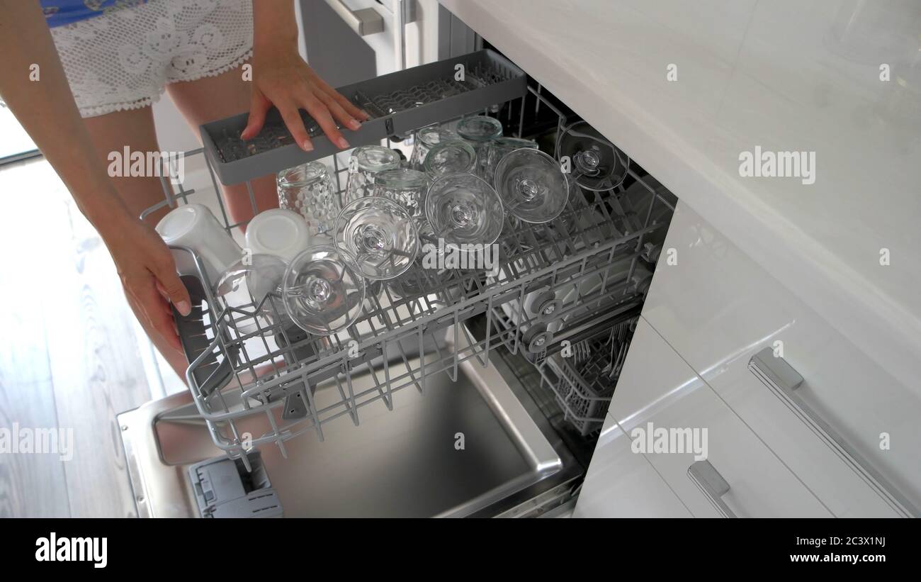 Unload dishwasher hi-res stock photography and images - Alamy