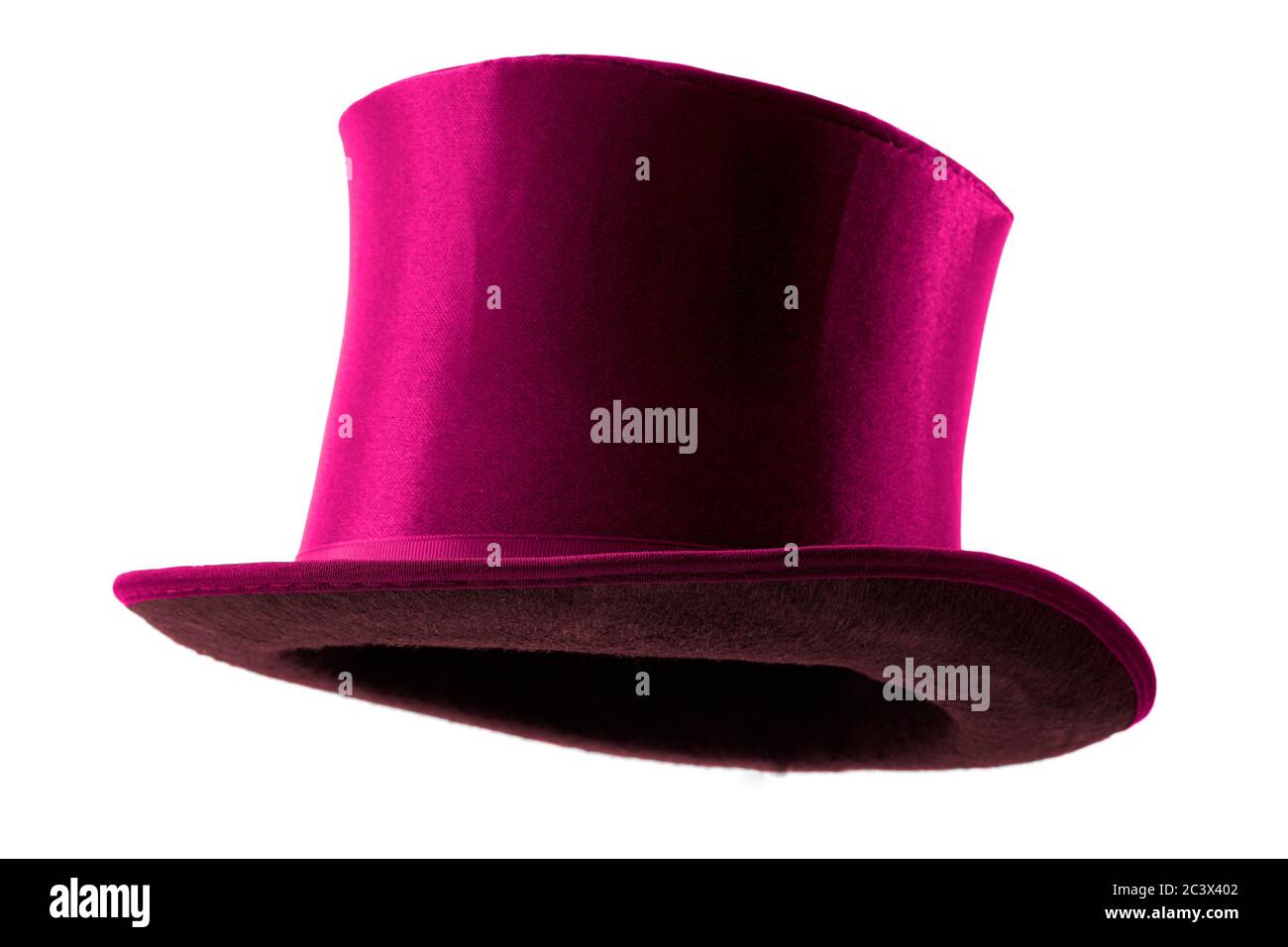 Stylish attire, vintage men fashion and magic show conceptual idea with 3/4 angle on victorian pink top hat with clipping path cutout in ghost mannequ Stock Photo