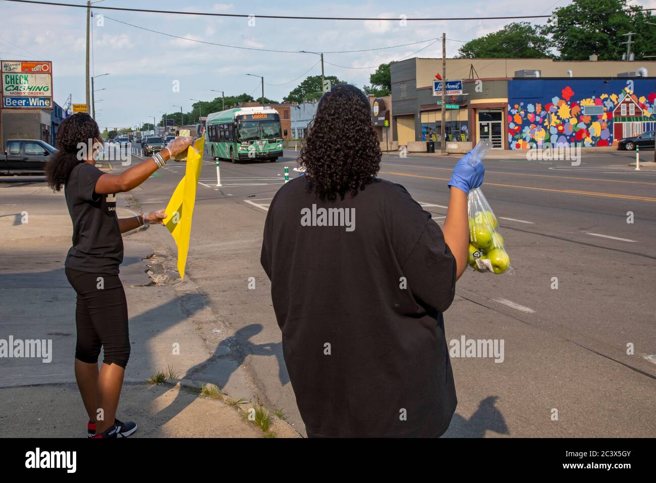 Detroit, Michigan - Members of Saved by Grace Christian Ministries hand out free fruit and vegetables in front of their church during the coronavirus Stock Photo