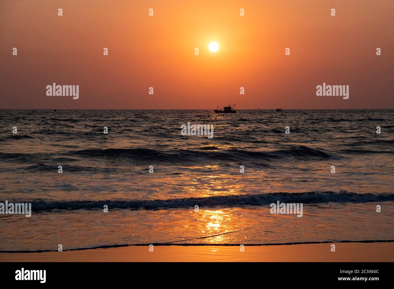 Sunset at Majorda beach in Goa, India Stock Photo