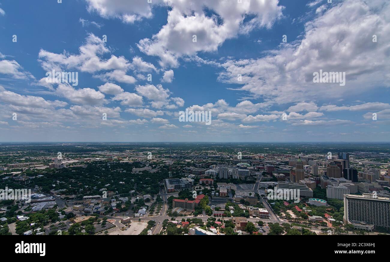 Cityscape view san antonio from observation deck of tower of america showing large urban sprawl of busy city reopening after stay at home orders. Stock Photo