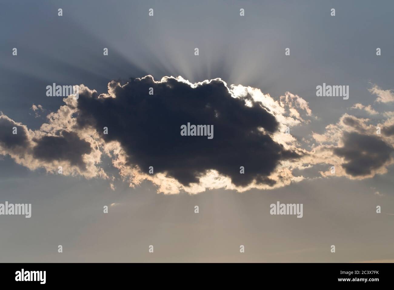 The sun behind the cloud. Sunny day. Stock Photo