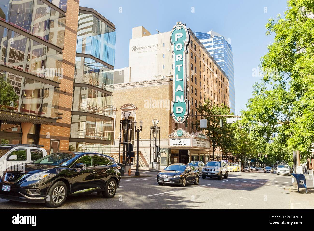 Portland, OR USA - June 27, 2018: SW Broadway street in Portland with Arlene Schnitzer Concert Hall, The Heathman Hotel and Antoinette Hatfield Hall, Stock Photo