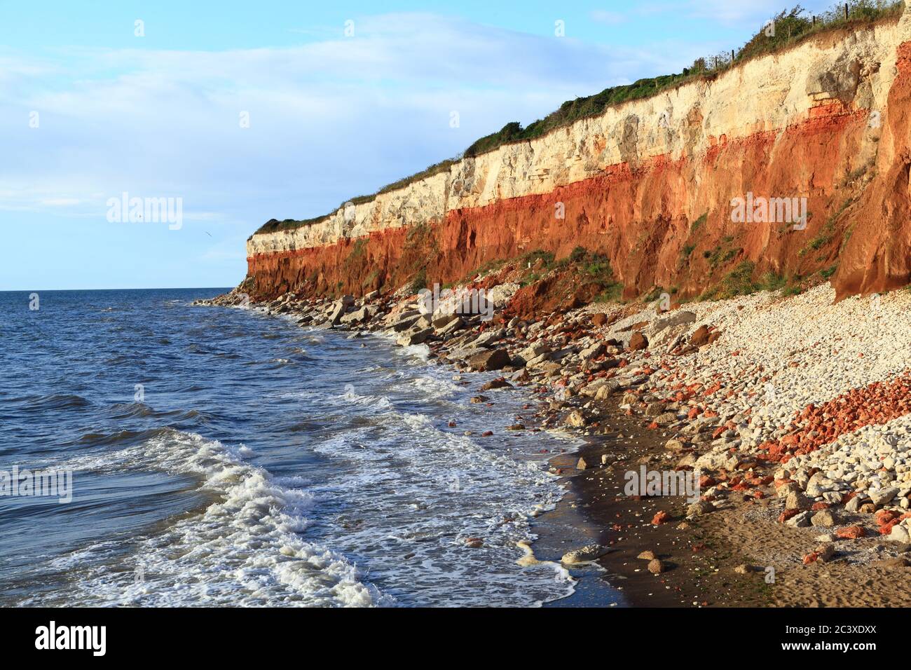 Old Hunstanton Cliffs, High Tide, Carstone, Chalk, stripes, striped, North Sea, The Wash, Norfolk, England, UK Stock Photo