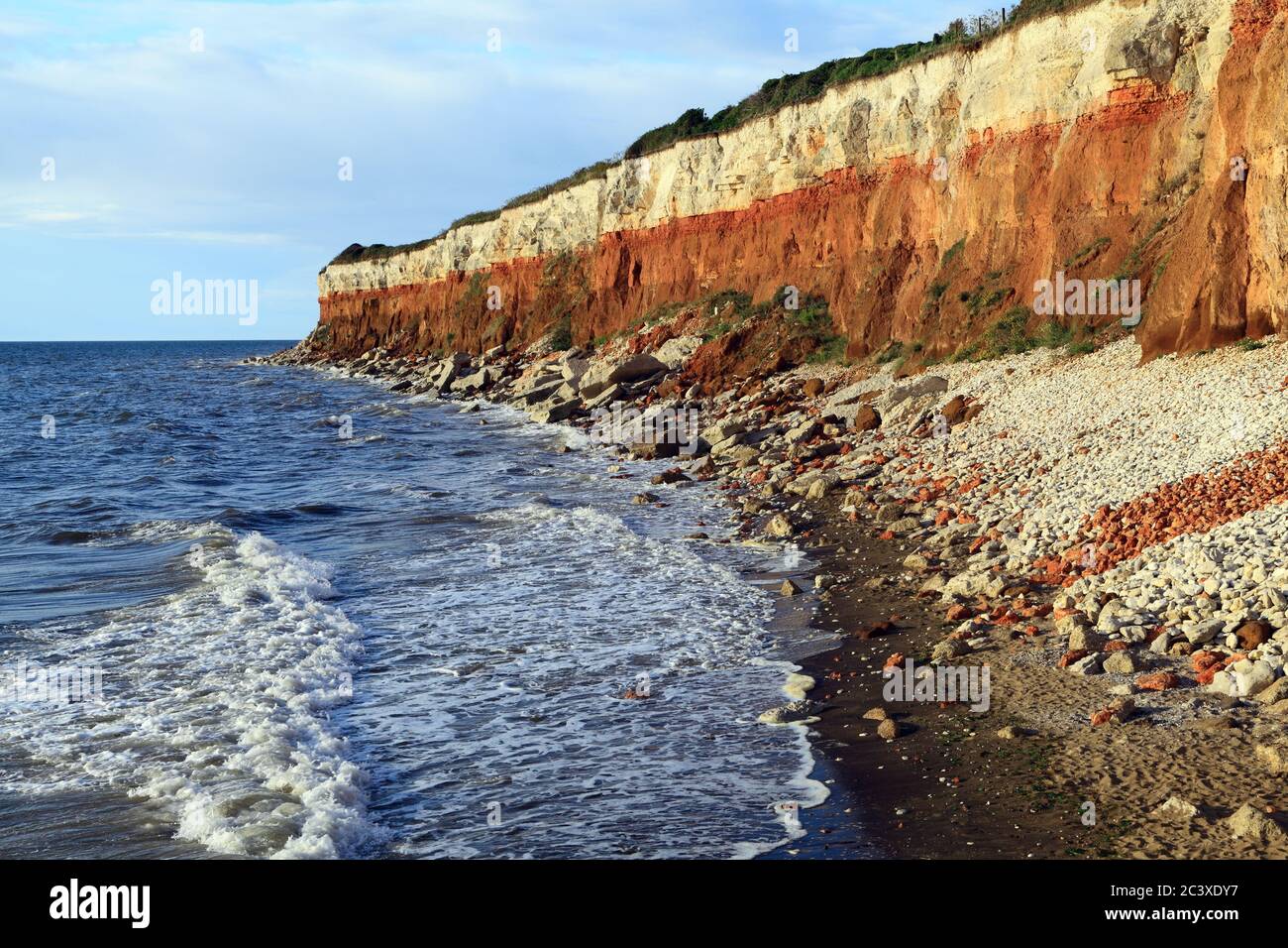 Old Hunstanton Cliffs, High Tide, Carstone, Chalk, stripes, striped, North Sea, The Wash, Norfolk, England, UK Stock Photo