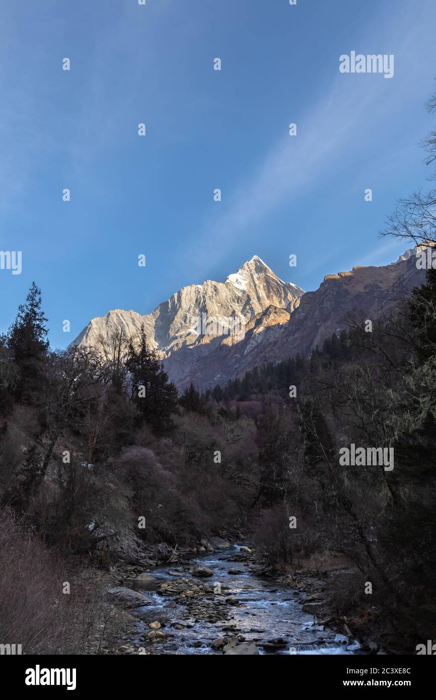 Stunning view of Yaomei Peak of Siguniang (Four Sisters) Mountain from Changping Valley located bordering area of Rilong Town, Xiaojin County, Wenchua Stock Photo