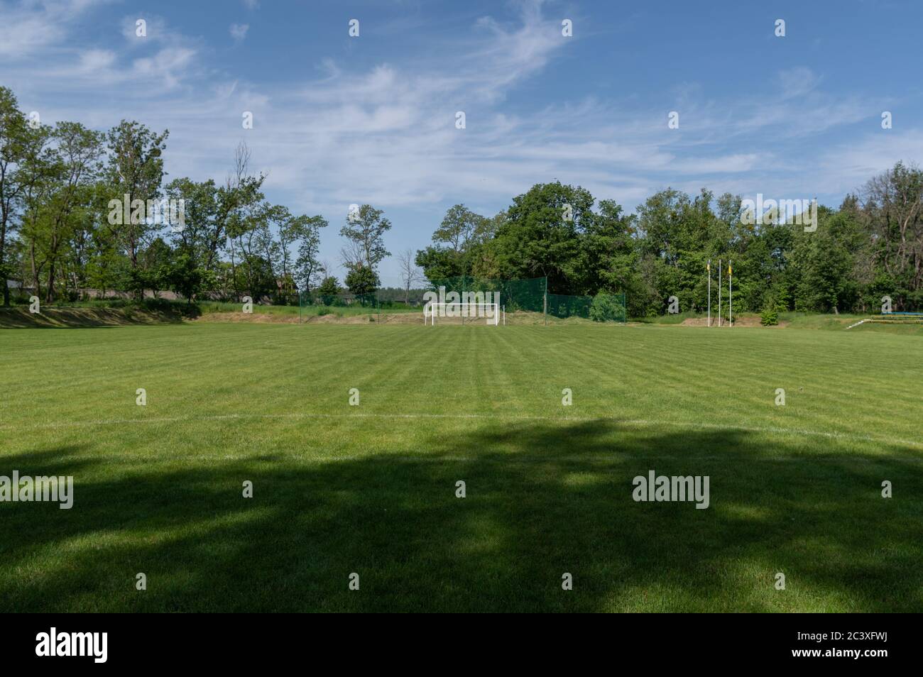 The gate to the distance of the football field. Soccer field and goal