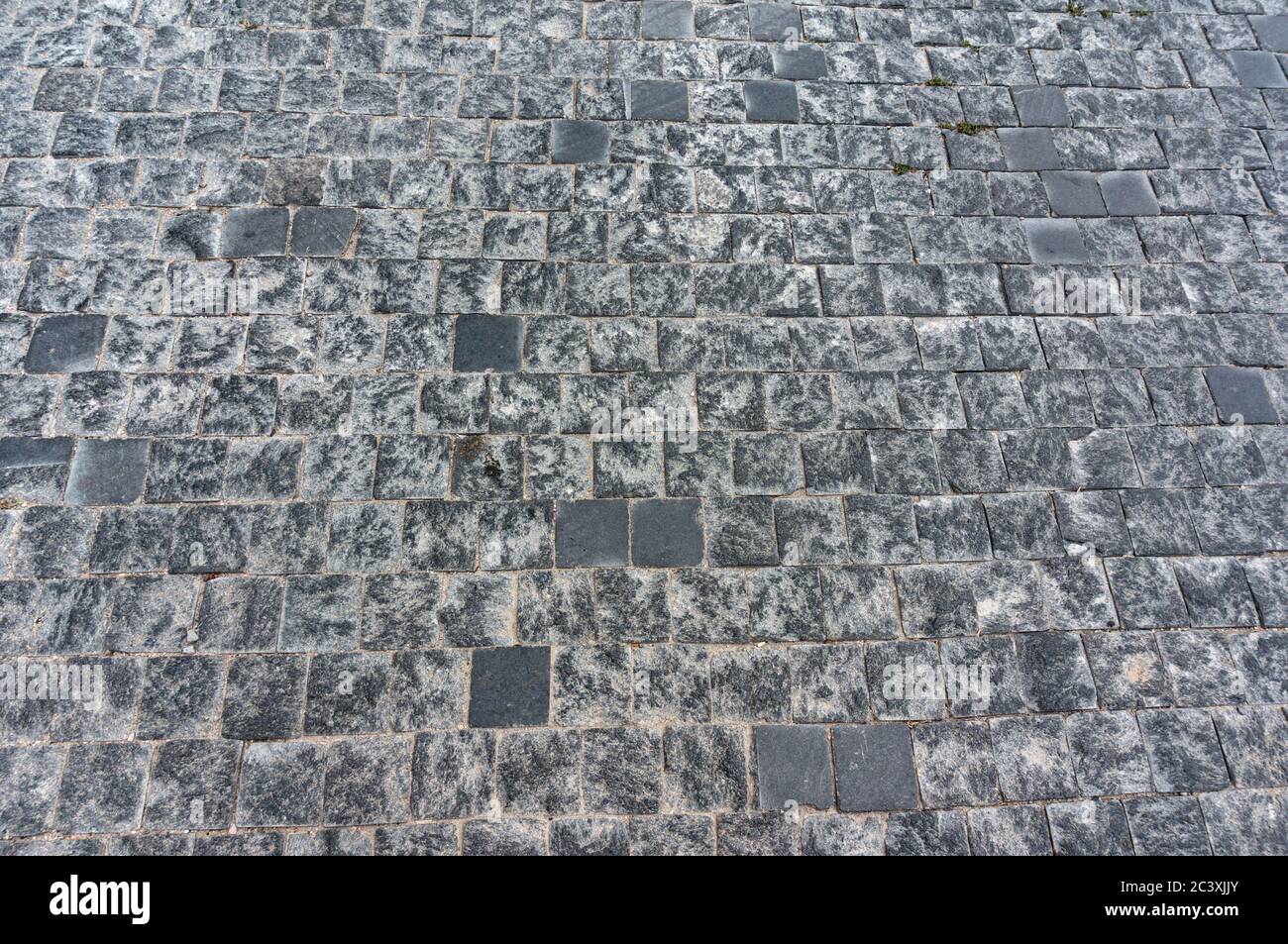 Granite cobblestoned pavement background Stock Photo