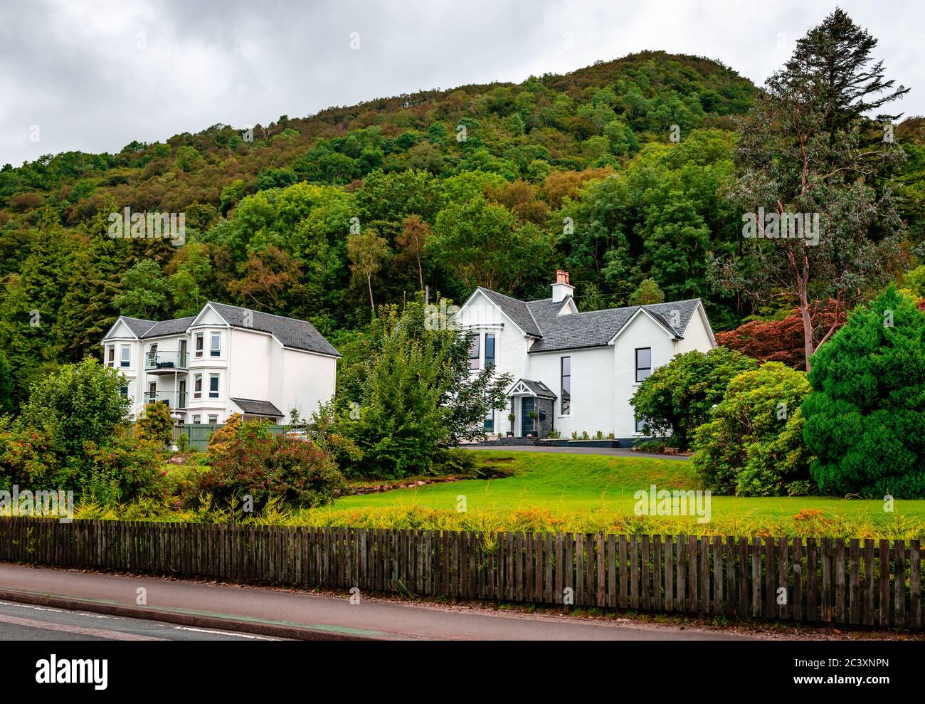 Isolated blackrock houses in the Scottish Highlands, near village Ballachulish. Stock Photo