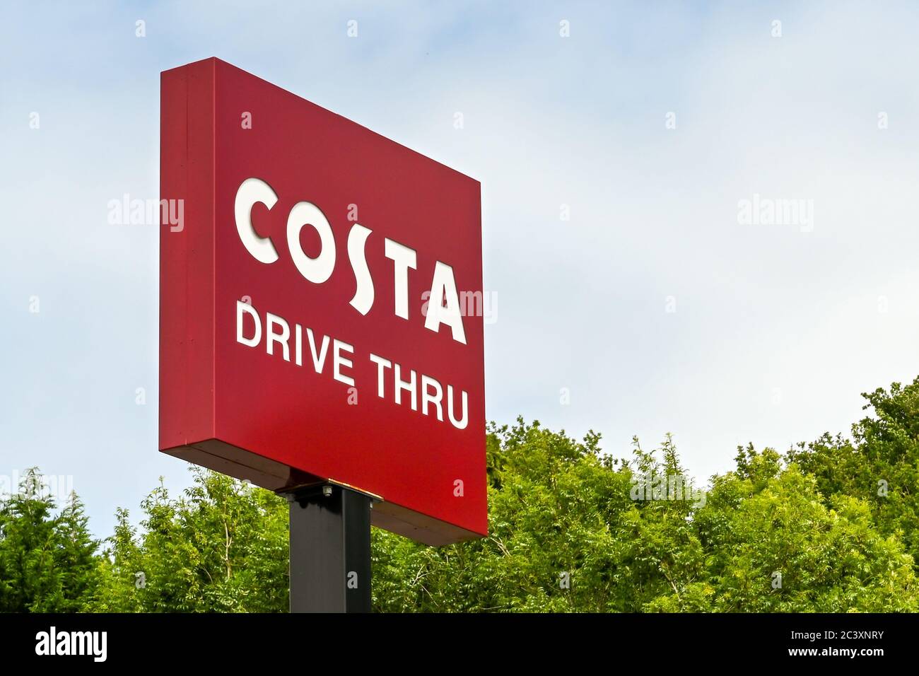 Talbot Green, Wales - June 2020: Sign for a Costa Coffee shop with a drive through facility. Costa is now owned by the Coca Cola company Stock Photo